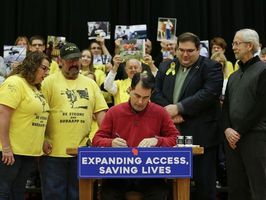 Gov. Scott Walker signs Dillon's Law bill at Mishicot High, making epinephrine more accessible